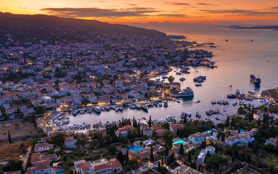The Old Harbour at dusk — neoclassical mansions and working boatyards
